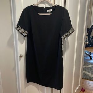 Calvin Klein black short sleeve Dress size 6 with sleeve sequence